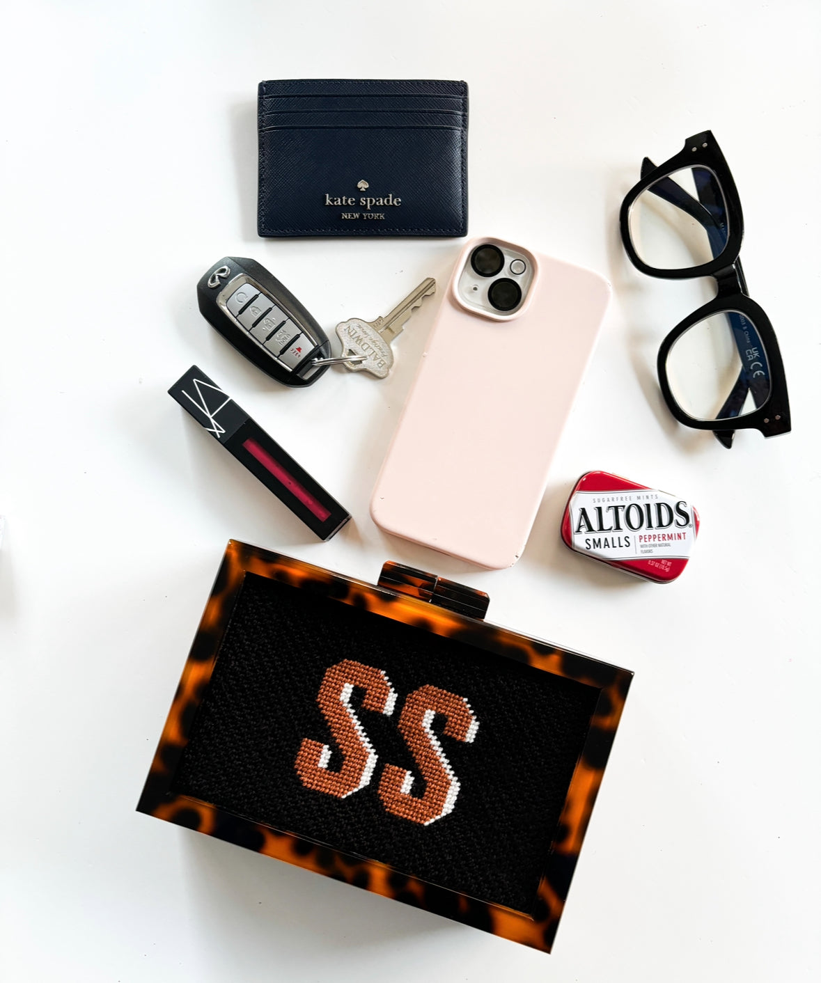 the𝗡𝗗𝗟𝗣𝗧bag™ acrylic clutch bag with painted monogram